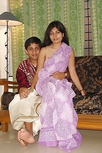 absorbs indian wife in saree and swimsuit